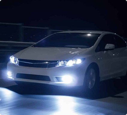 Car Driving at night with Headlights lite.